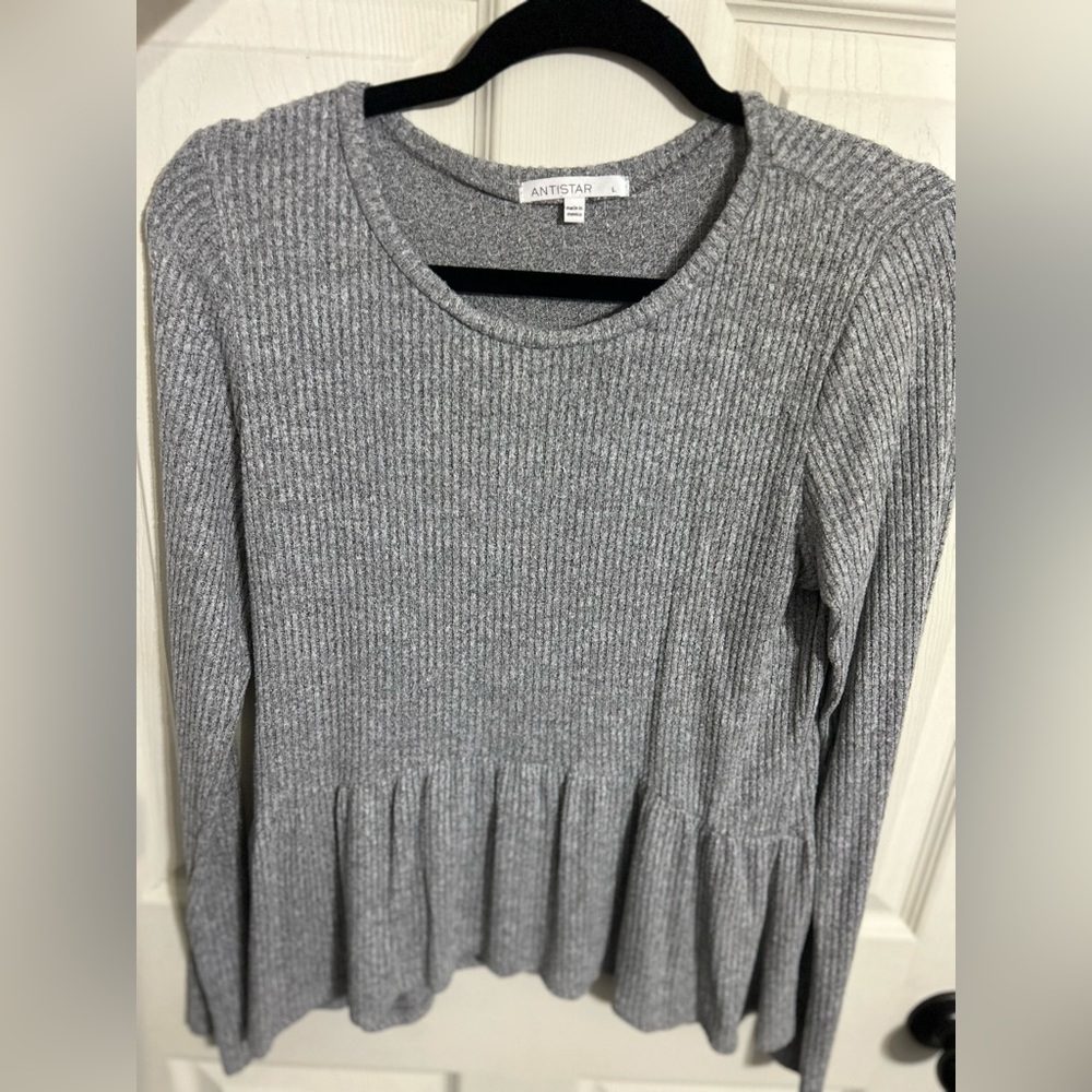 Long sleeve sweater material shirt.